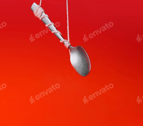 Preview: Levitating spoon on red background