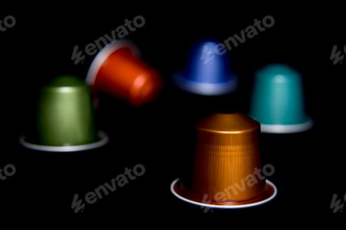 Preview: close up of a group of colored and randomly arranged coffee capsules