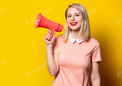 Preview: Blonde girl in pink dress with megaphone