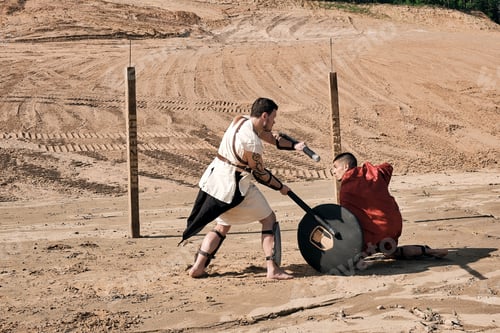 Preview: A Concept Photo Of A Roman Battle Of Two Warriors Of The Colosseum In Action With Aggressive