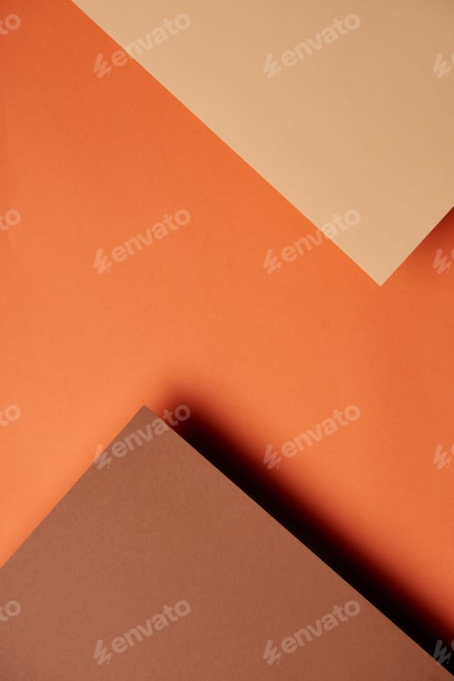 Preview: Paper sheets in brown and orange tones background