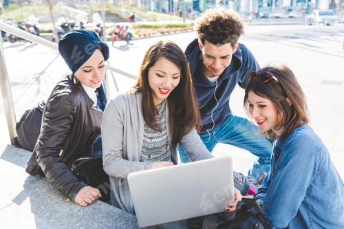 Preview: Multiracial group young people using technology