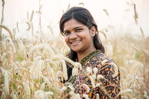 Preview: Smiling woman farmer in agricultural field