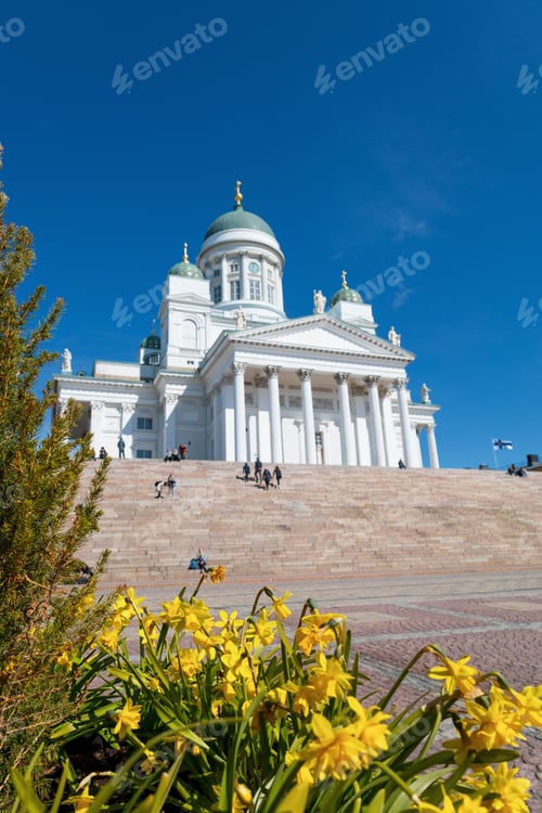 Preview: Low angle shot of the exterior design of St. Nicholas Cathedral in Helsinki Temple with visitors
