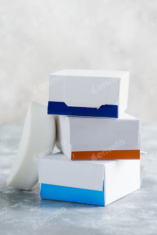 Preview: Set from three paper mock up boxes for packaging spa soap products on a marble grey background