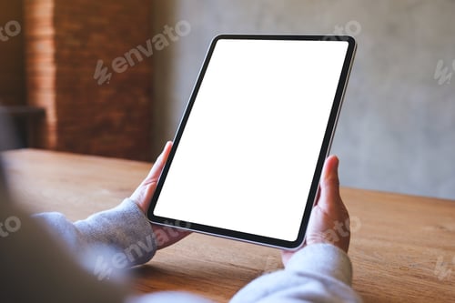 Preview: Hands Hold Tablet with Blank Screen Indoors