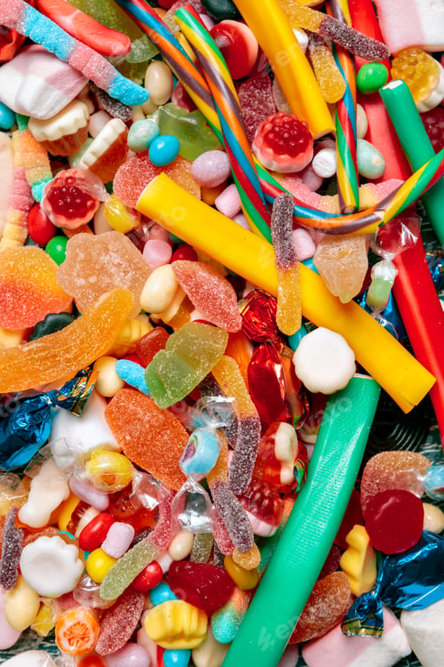 Preview: Colorful candies on old background