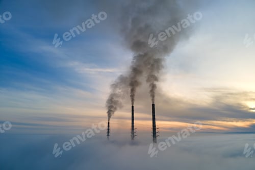 Preview: Coal power plant high pipes with black smoke moving upwards polluting atmosphere