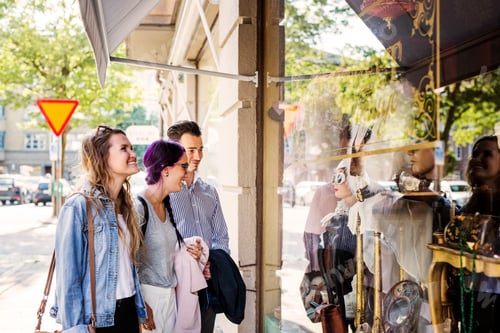 Preview: Young friends window shopping
