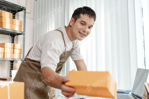 Preview: Ecommerce startup business model with entrepreneur preparing goods for delivery