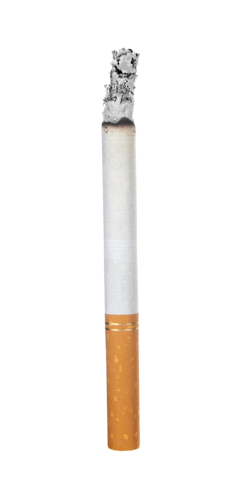 Preview: Burning cigarette on white