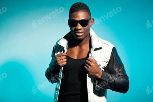 Preview: Cool Urban Stylish Black American Man. Fashion Studio Shot.