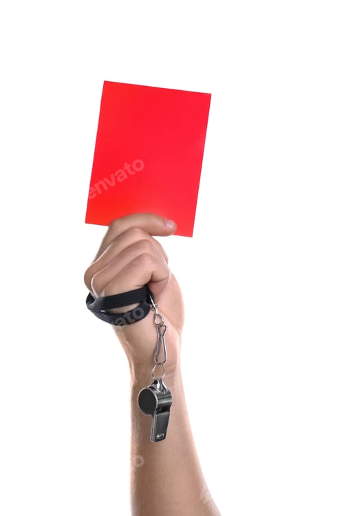 Preview: Football referee with whistle holding red card on white background, closeup