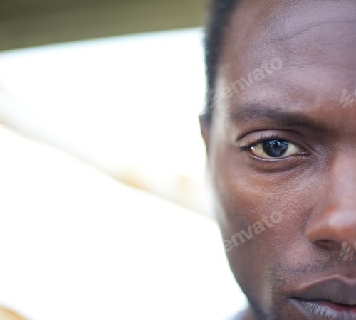 Preview: Half face portrait of an african american man