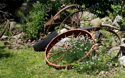 Preview: Big Old Rusted Carriage Wheels On The Ground