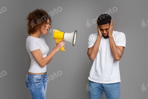 Preview: African-american girl shouting through megaphone at her boyfriend