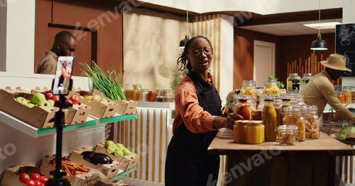 Preview: African american vendor promoting homemade sauces and honey