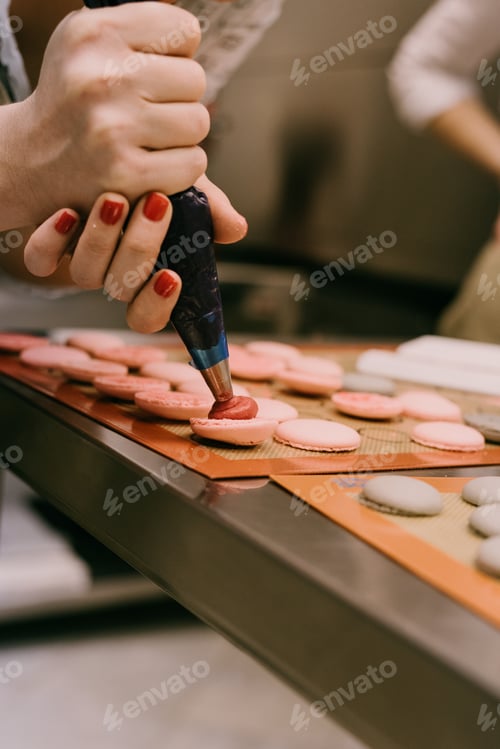 Preview: Baking pastry, preparing macaroons. Sweet treats. French pastry baking. Fílling.