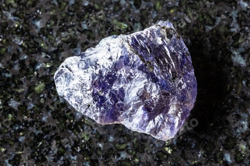 Preview: sample of uncut cordierite mineral on black