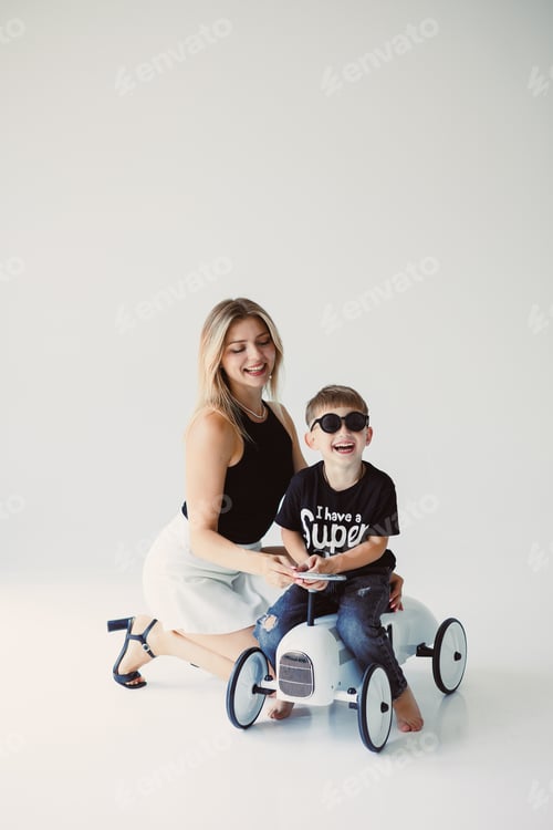 Preview: Playful Moments A Mother and Her Son Enjoying a Joyful and FunFilled Ride Together