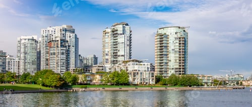 Preview: Residential Home Buildings in Modern City. Sunny Blue Sky Day.