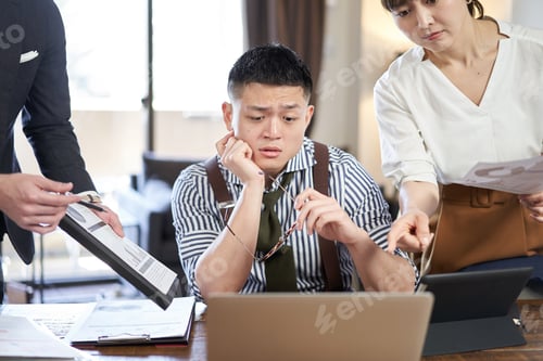 Preview: Asian male businessman chased by workload and deadlines