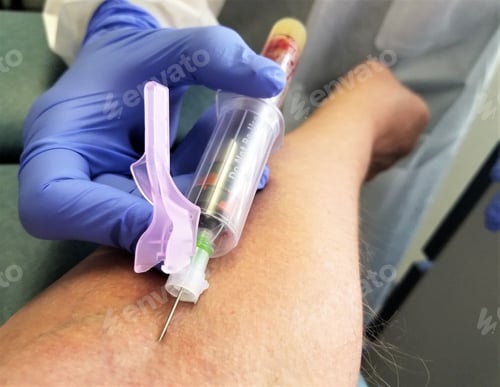 Preview: Drawing Blood! The phlebotomist fills a vial with blood, received from the patient for testing.