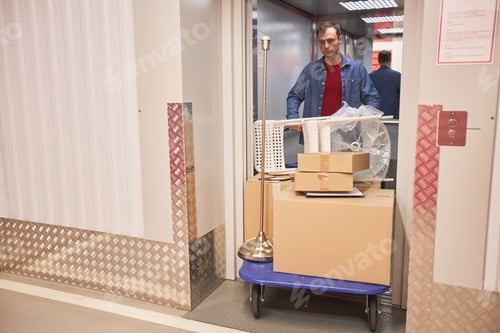 Preview: Man Pushing Cart out of Elevator