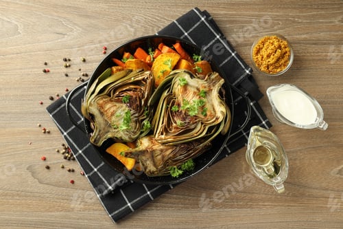 Preview: Concept of tasty food with grilled artichoke, top view
