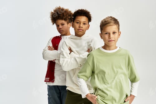 Preview: Vibrant friendship unites adorable boys in stylish outfits showcasing camaraderie
