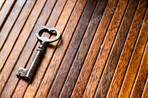 Preview: the old key lies on an old wooden table, natural textures, the concept of discoveries, secrets