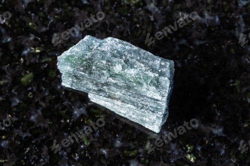Preview: sample of raw indigolite mineral on black granite