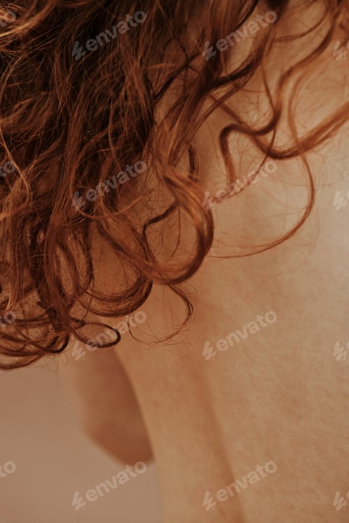 Preview: Shirtless woman with red hair