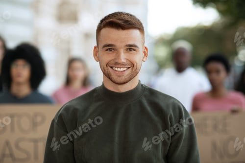 Preview: Cheerful guy over international group of protestors