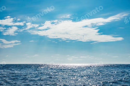 Preview: Sun behind clouds over Pacific ocean