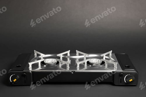 Preview: Portable gas stove on dark grey background, space for text. Military equipment