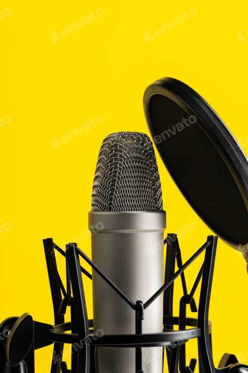 Preview: Professional microphone stand over yellow studio background