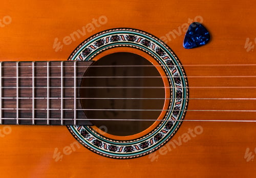 Preview: Classical wooden guitar strings close up