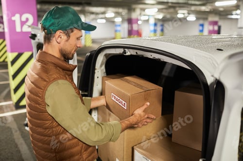 Preview: Man Loading Van Side View