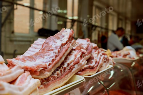Preview: Fresh pork for sell in local market. Seller cut pork to pieces. pork fat on the market