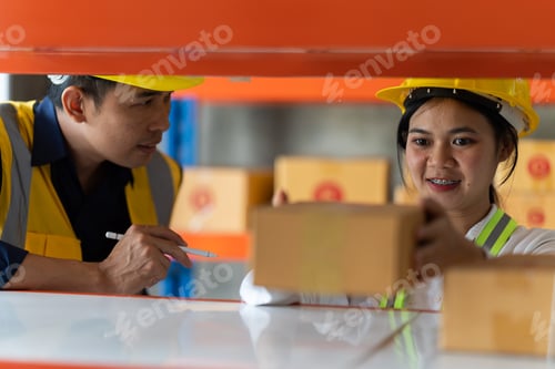 Preview: Male and Female warehouse workers discussing shipping schedule next to the forklift. Warehouse