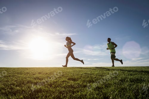 Preview: Two people enjoying a run in the serene outdoors at dusk.