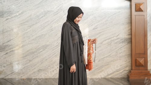 Preview: Muslim woman after worship at the mosque