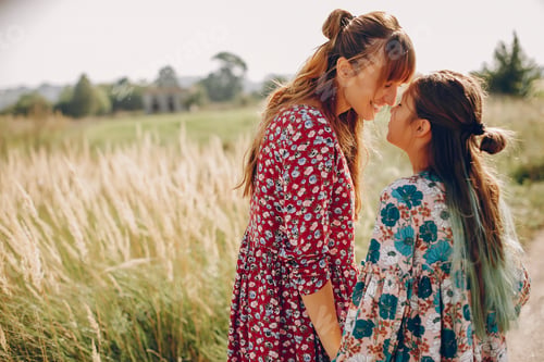 Preview: Cute and stylish family in a summer field