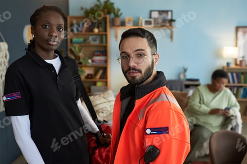 Preview: Portrait of Young Black Woman and Caucasian Man Working as Paramedics