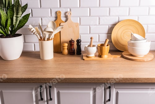 Preview: A set of various kitchen tools, utensils made of friendly materials on the kitchen countertop