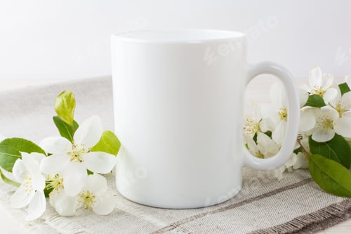 Preview: White coffee mug mockup with apple blossom