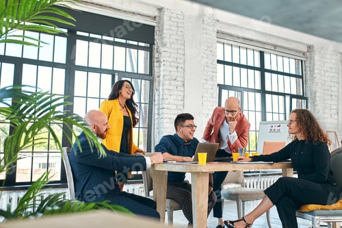 Preview: Business meeting in an office, the businesspeople are discussing a document