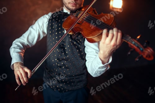 Preview: Male fiddler playing classical music on violin