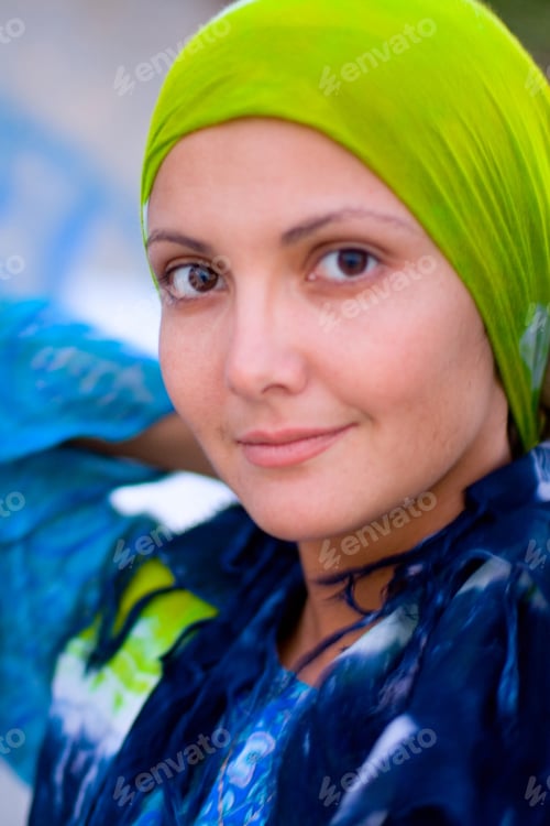 Preview: pretty woman in green kerchief